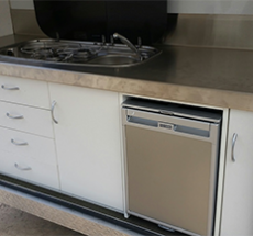 The Bivouac Escape - kitchen Kitchen in mini caravan tucked away at rear