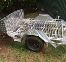 Motorbike trailer with storage box